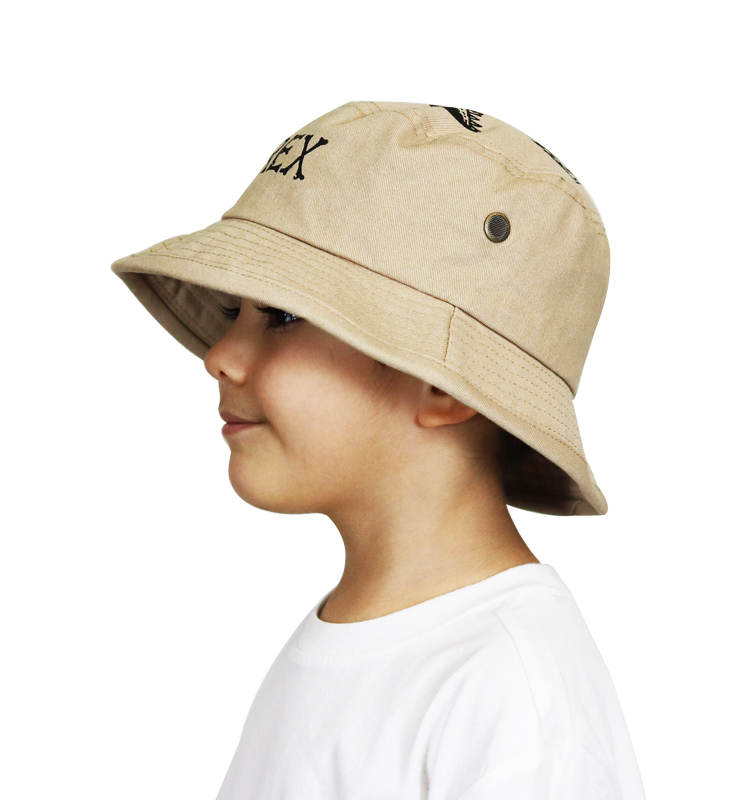 Dinosaur Bucket hat on child left side