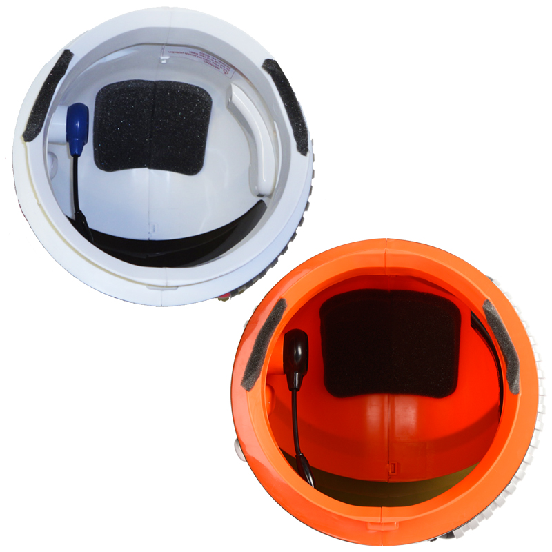 White and orange astronaut helmets with sound, inside view.